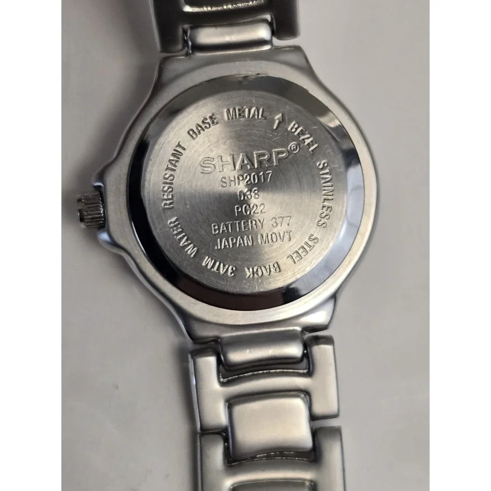 Sharp Purple Dial Date Indicator Silver Tone Round Case Linkn‎ Band Quartz Watch